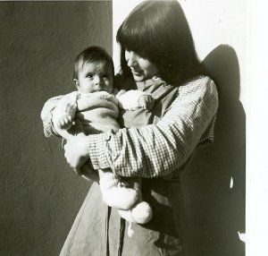 Ursula Biondi holds her infant son (both dressed in prison clothes) in this undated photo. Biondi was among thousands of Swiss teenagers and young adults who were sent to prison or labor camps without trial. After decades of silence, they are now speaking out. 